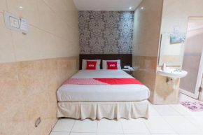Отель OYO 1702 Harmoni Inn Makassar  Макассар